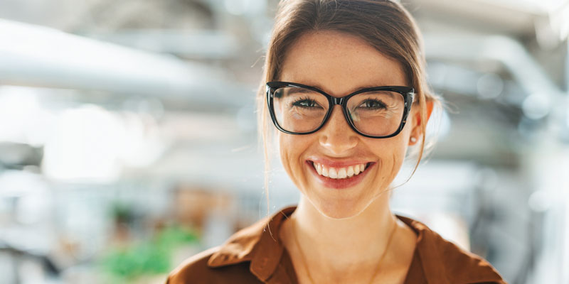 Smiling woman with glasses